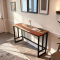 Walnut epoxy resin console table behind a sofa, featuring a volcano-inspired pearlescent resin flow with molten-lava shimmer and glossy finish.