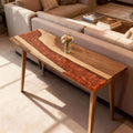 Behind-the-couch console table featuring walnut with a volcano-effect pearlescent resin river, polished surface, and sleek metal legs.