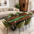 Black walnut epoxy resin table in a luxury living room, featuring an emerald green river epoxy with marbled swirl texture and glossy finish.