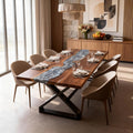 Formal entertaining space featuring a black walnut epoxy resin dining table with smoky gray-blue resin inlay and modern metal base.