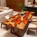 Olive wood epoxy resin table in a modern living room, featuring an amber epoxy surface with artistic marbled patterns and natural wood figure.