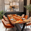 Olive wood epoxy resin dining table in a modern dining room, featuring a warm amber epoxy design with dramatic natural grain patterns.