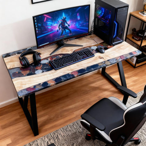 French poplar epoxy resin desk with a clear creek-style river filled with smooth pebbles, styled in a bright home office workspace.
