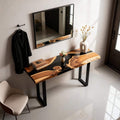 Behind-the-couch setup featuring a walnut epoxy resin sofa table, deep black resin inlay, and polished surface reflections.