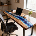 Corporate workspace featuring a black walnut blue river epoxy desk, polished surface, laptop, and minimalist office decor.