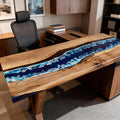 Remote work home office featuring a black walnut epoxy resin desk with navy blue river epoxy and bright natural daylight.