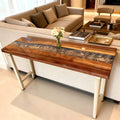 Walnut epoxy resin table featuring a silver-gray river epoxy inlay with glossy finish and rich natural wood grain.
