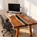 Corporate workspace featuring a walnut blue river epoxy desk, styled with laptop, mouse, and clean desk accessories.