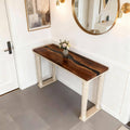 Black walnut epoxy resin table featuring a deep black resin river inlay with glossy finish and rich natural wood grain.